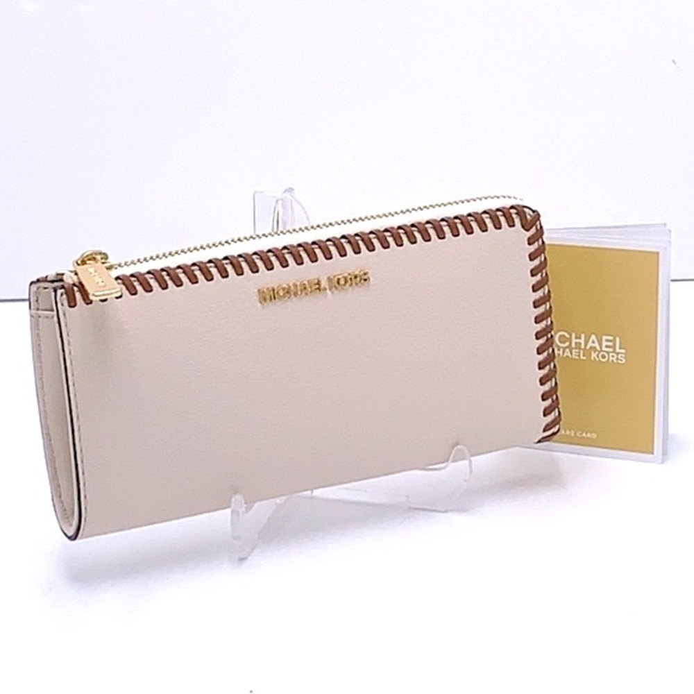 MICHAEL KORS JET SET TRAVEL LARGE THREE QUARTER ZIP WALLET LIGHT CREAM MULTI